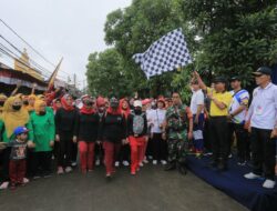 Gerak jalan warga kelurahan cibodasari (Ihya/indonesiadaily.net)